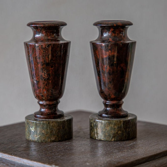 A PAIR OF SMALL MARBLE VASES