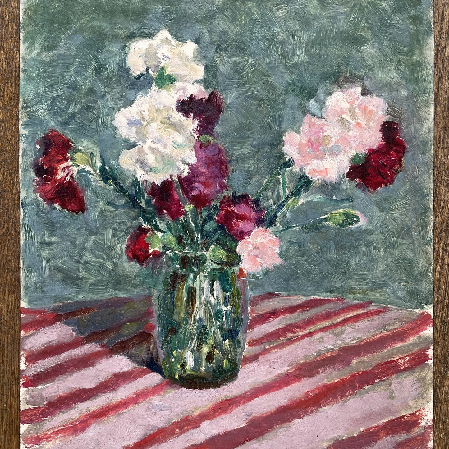 Carnations in a Green Vase on a Pink Striped Tablecloth