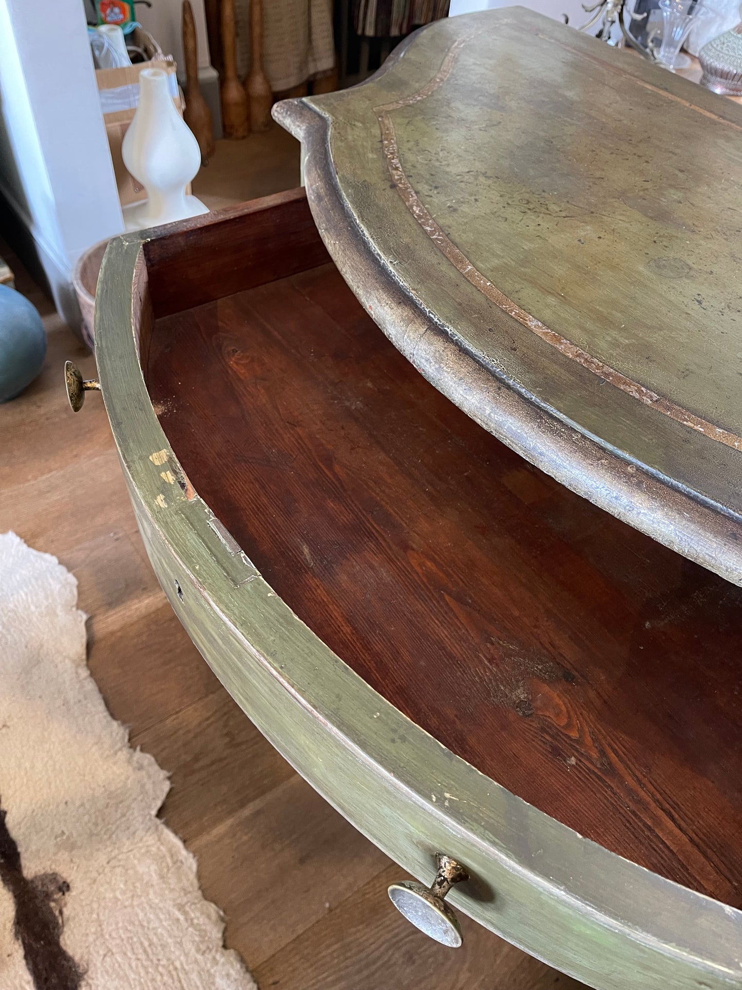 Serpentine Chest of Drawers.