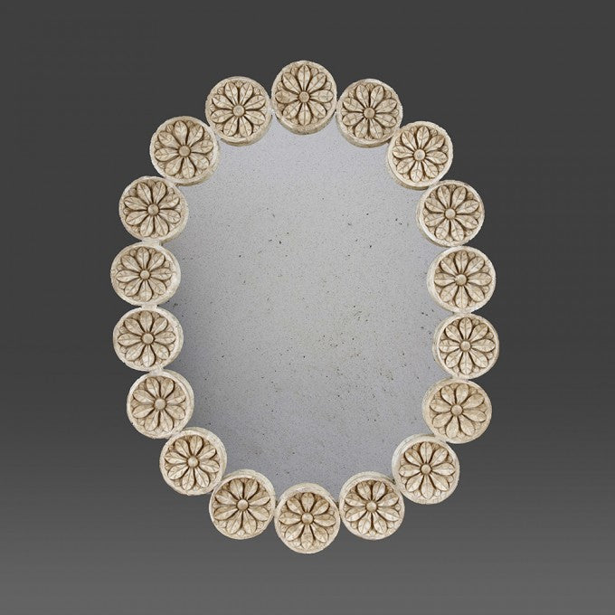 A Large Oval Mirror with Carved Roundels