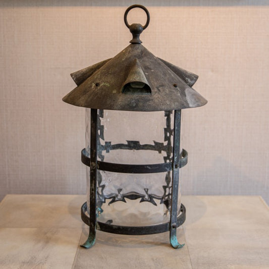 AN EARLY 20TH CENTURY CIRCULAR ARTS AND CRAFTS LANTERN