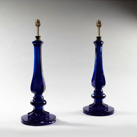A PAIR OF GLASS BALUSTER LAMPS
