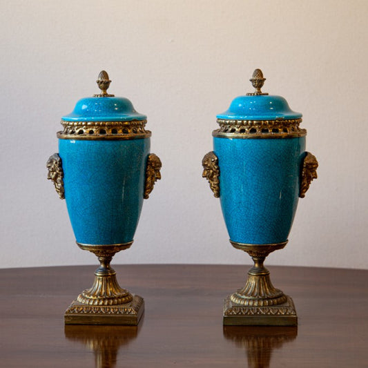 A PAIR OF 19TH CENTURY ORMOLU MOUNTED TURQUOISE VASES