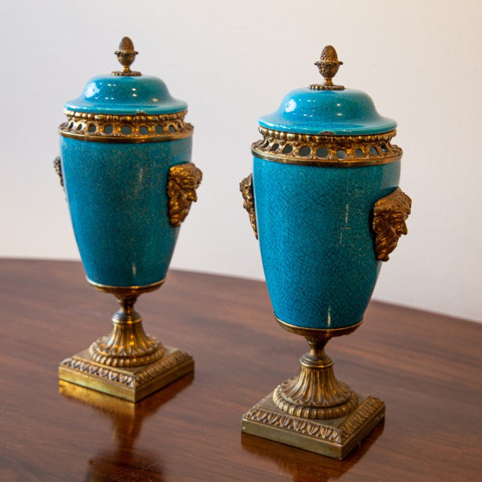 A PAIR OF 19TH CENTURY ORMOLU MOUNTED TURQUOISE VASES