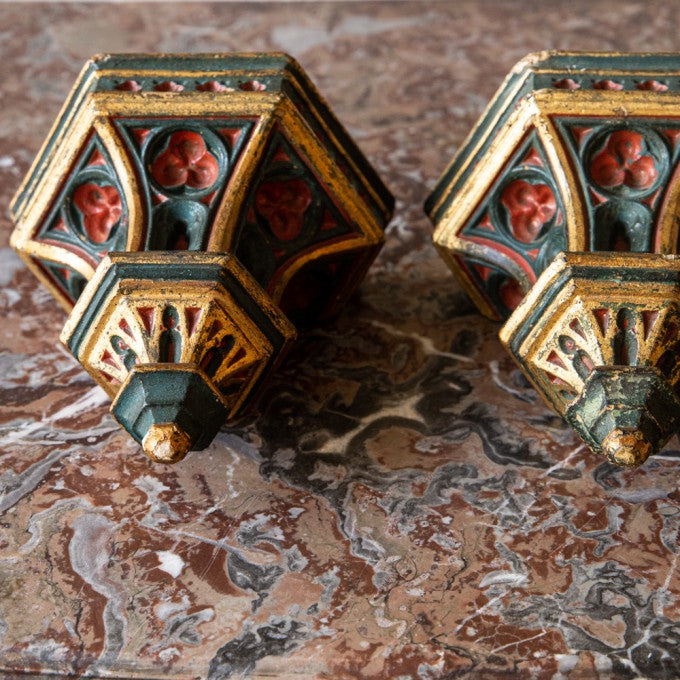 A PAIR OF POLYCHROME PLASTER GOTHIC BRACKETS