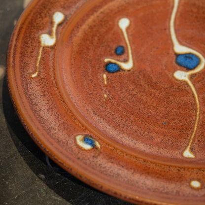 A Slipware Dish by Ray Winchcombe