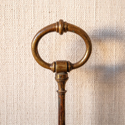 Large Brass and Mahogany Door Stop