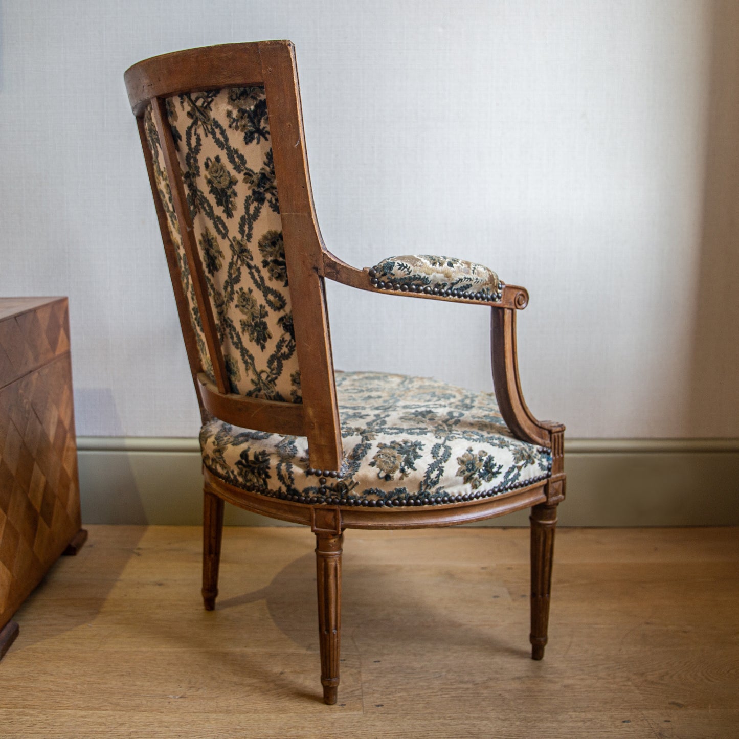 A Fruitwood Louis XVI Open Armchair