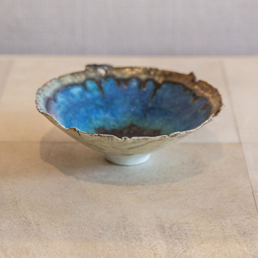 SMALL BLUE POTTERY BOWL WITH DECKLED EDGE